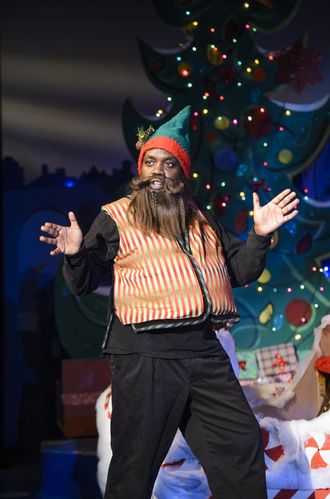 Enoch King as the male sidekick in the 2013 production of The Santaland Diaries. Photo credit: Greg Mooney.